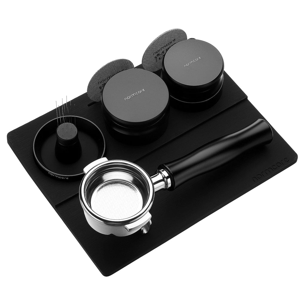 https://www.normcorewares.com/cdn/shop/products/normcore-wares--normcore-espresso-tamping-mat-v2-tamping-station-37681031741688_1024x.jpg?v=1694875987